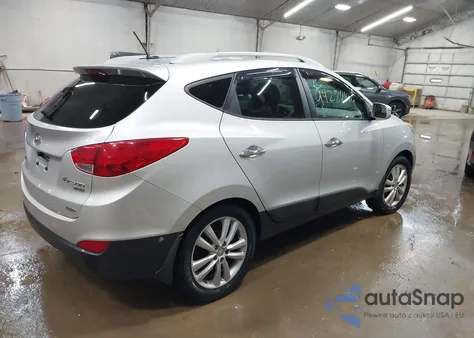 2011 Hyundai Tucson Limited z USA, uszkodzony, nr VIN KM8JUCAC8BU259698